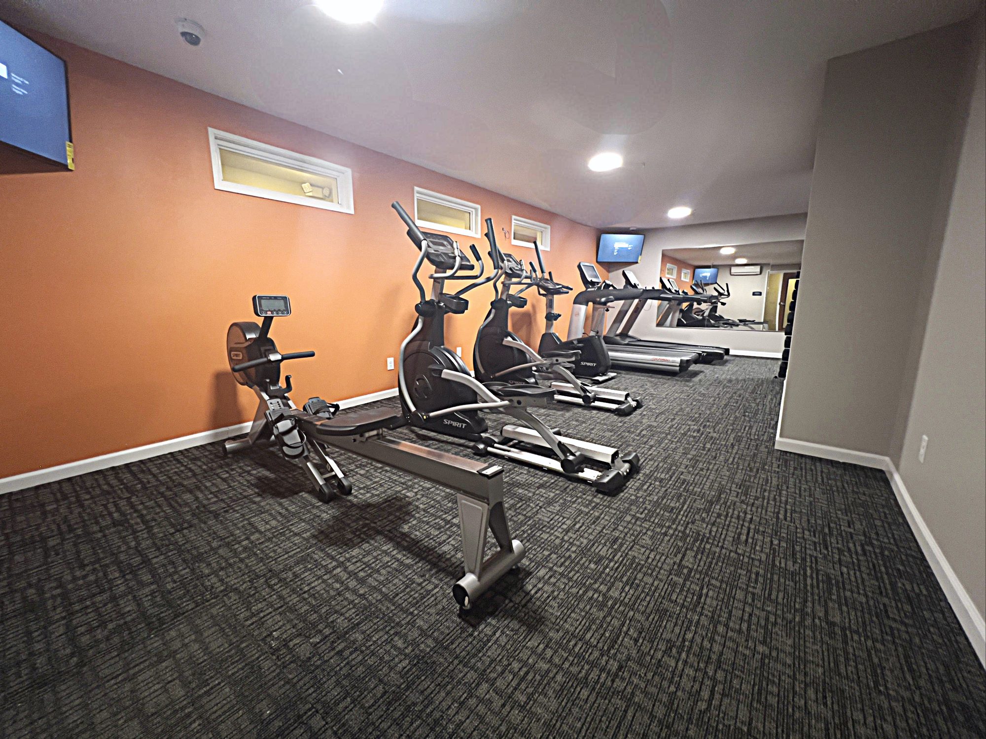 New fitness center with cardio equipment