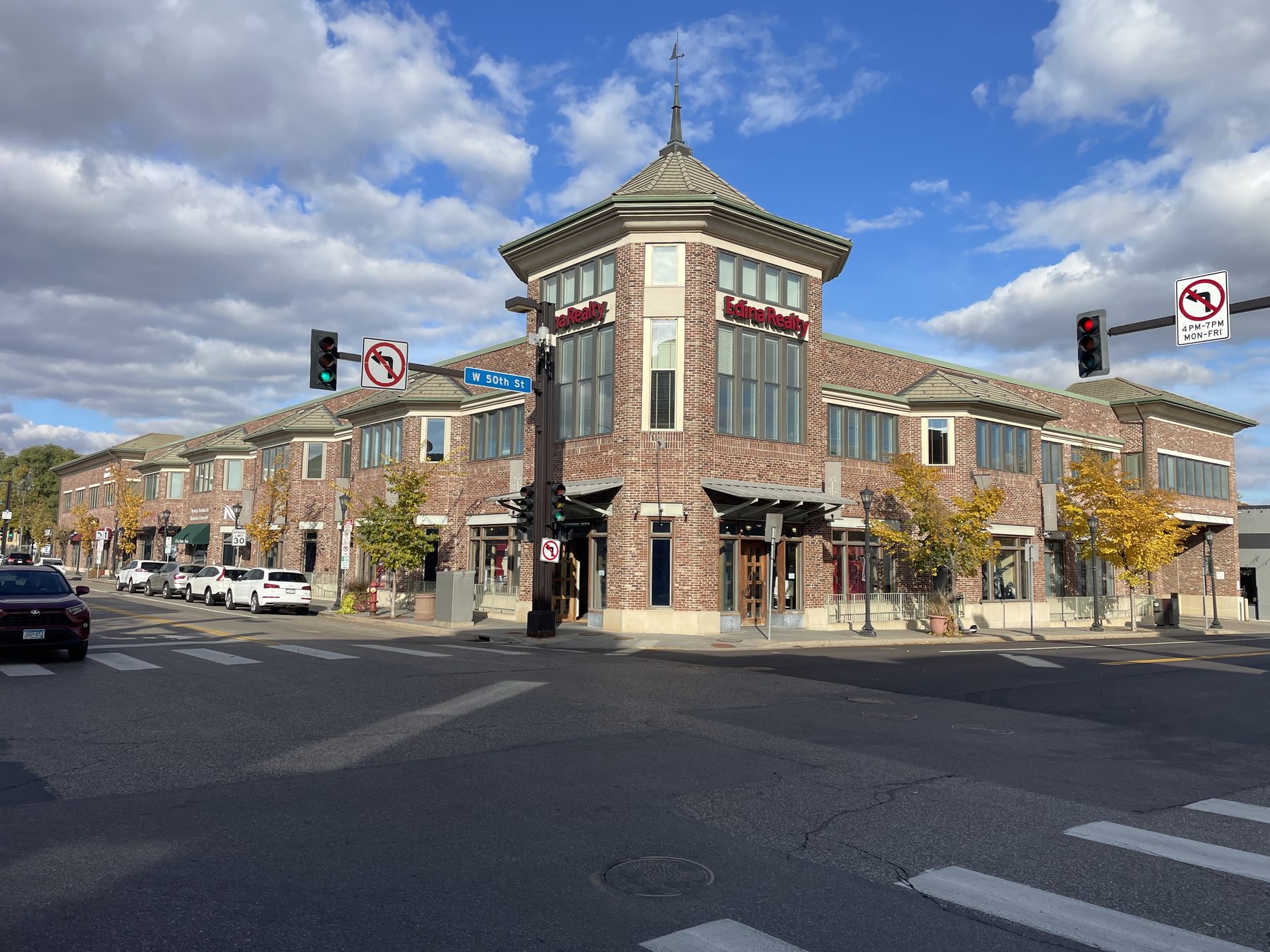 Brick mixed-use building with corner tower