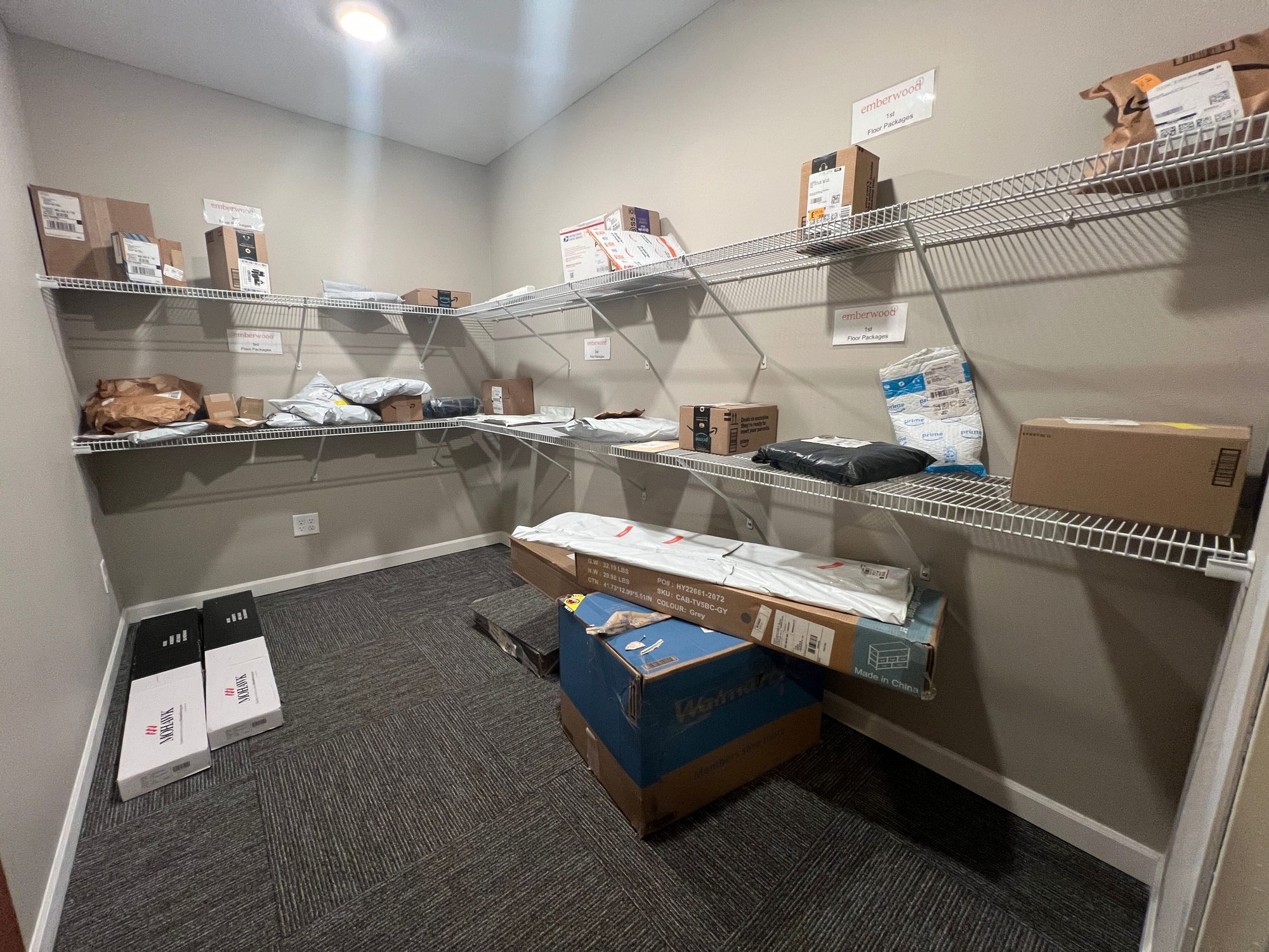 Secured package room with shelving
