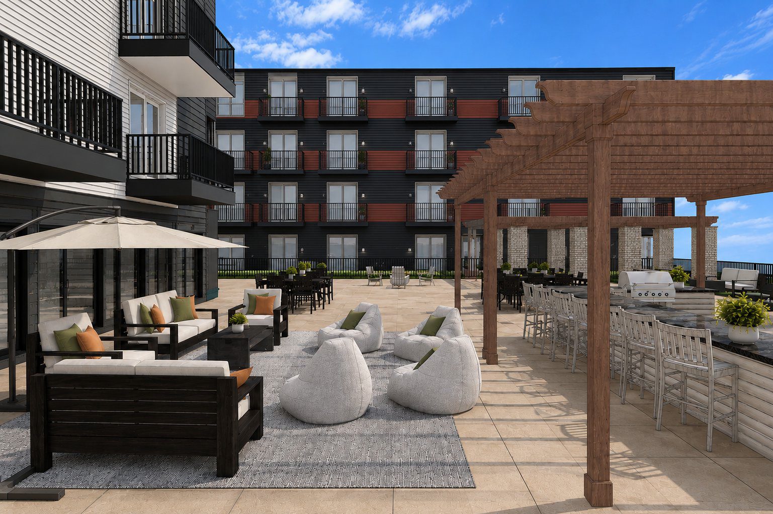 Daytime rooftop lounge seating under the pergola