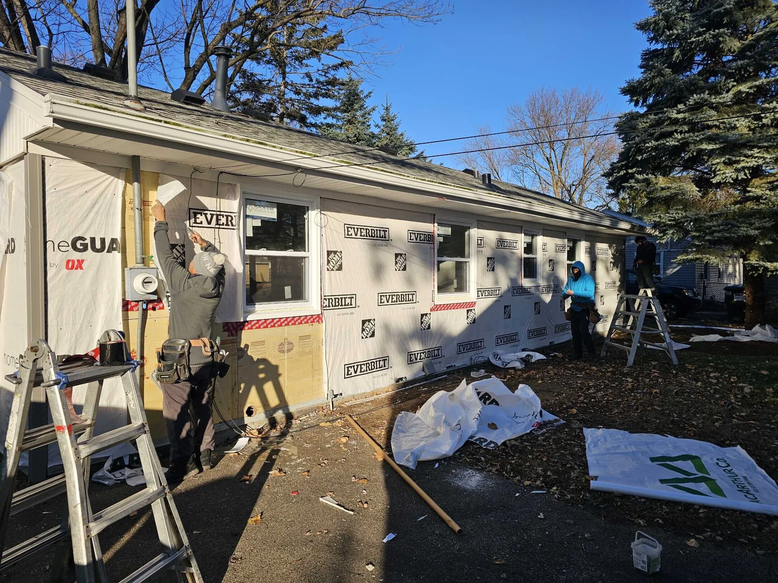 Before: house wrap on during the exterior rebuild