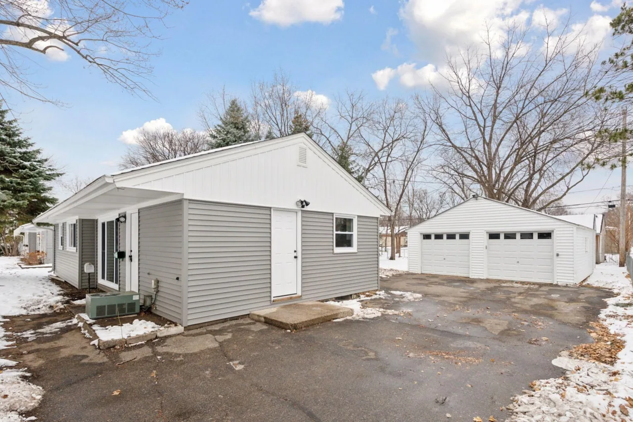 Rear elevation and detached garage after the rebuild