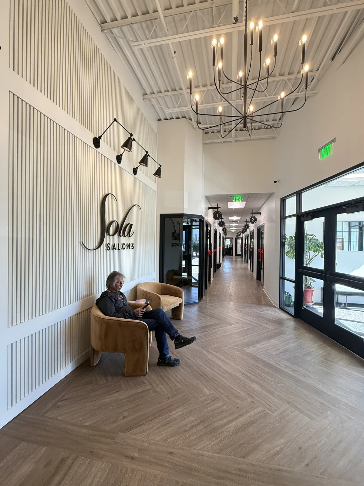 Main corridor running the length of the building beneath skylights